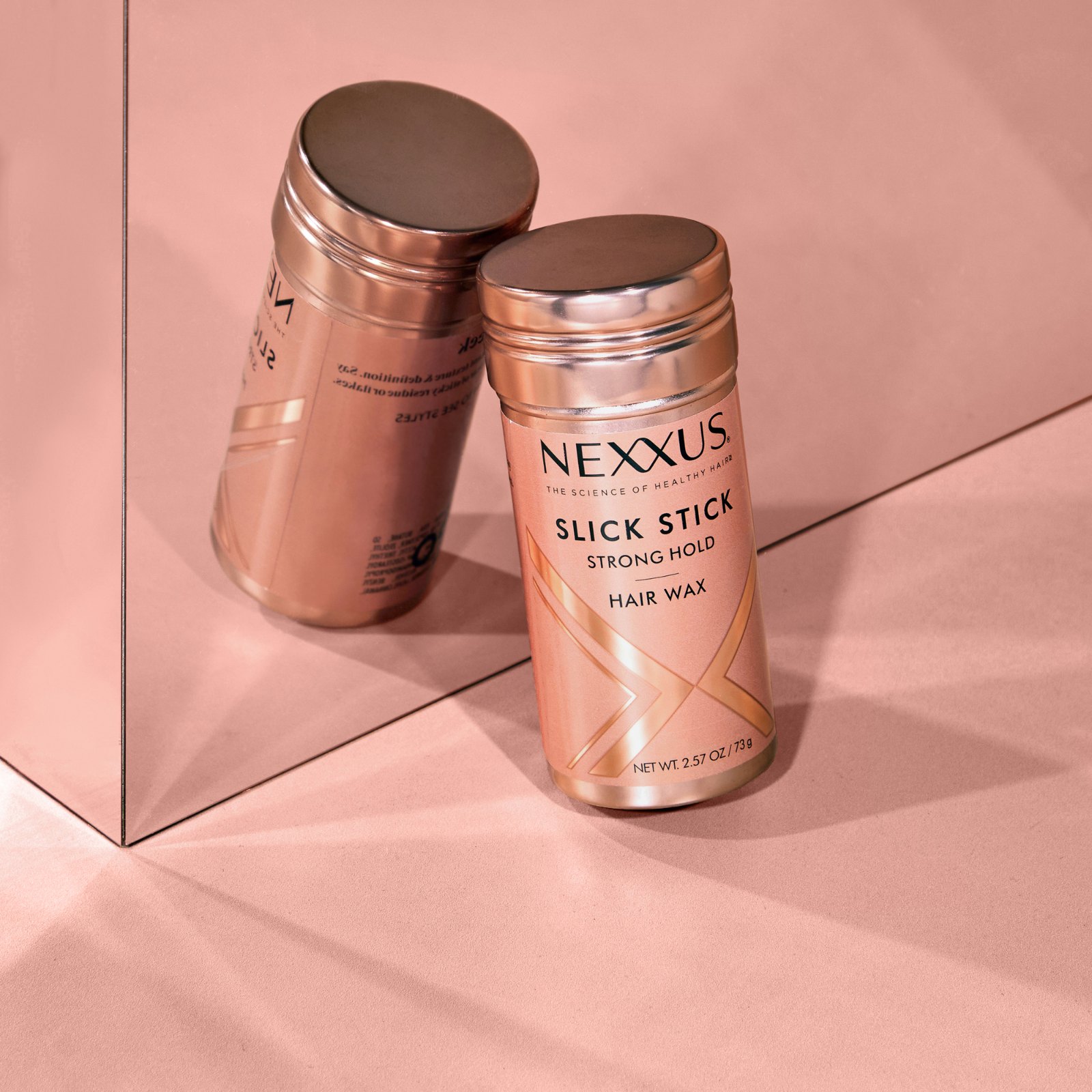 Nexxus Slick Stick reflected in mirror